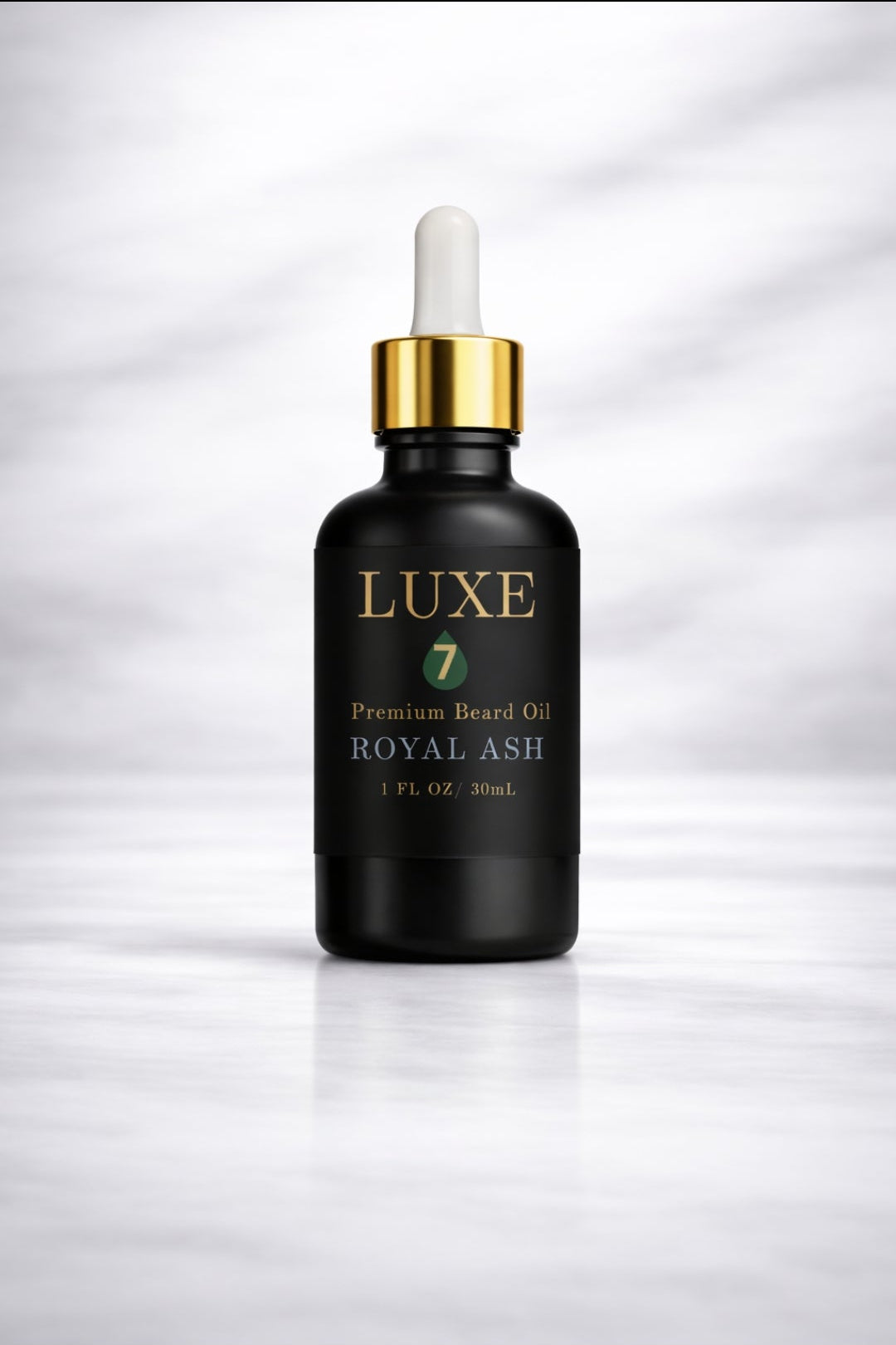 Luxe 7 Royal Ash Premium Beard Oil in a 1 fl oz (30 mL) black glass bottle with a gold-and-white dropper on a light marble background.